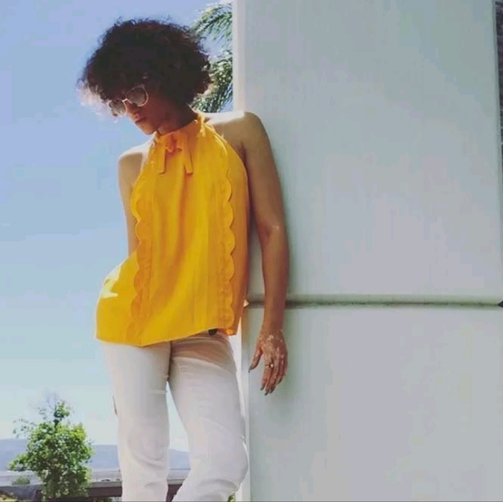 Victoria Beckham 2x marigold tank colab with Target